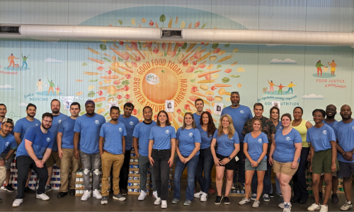 Team WebFirst volunteering at food bank